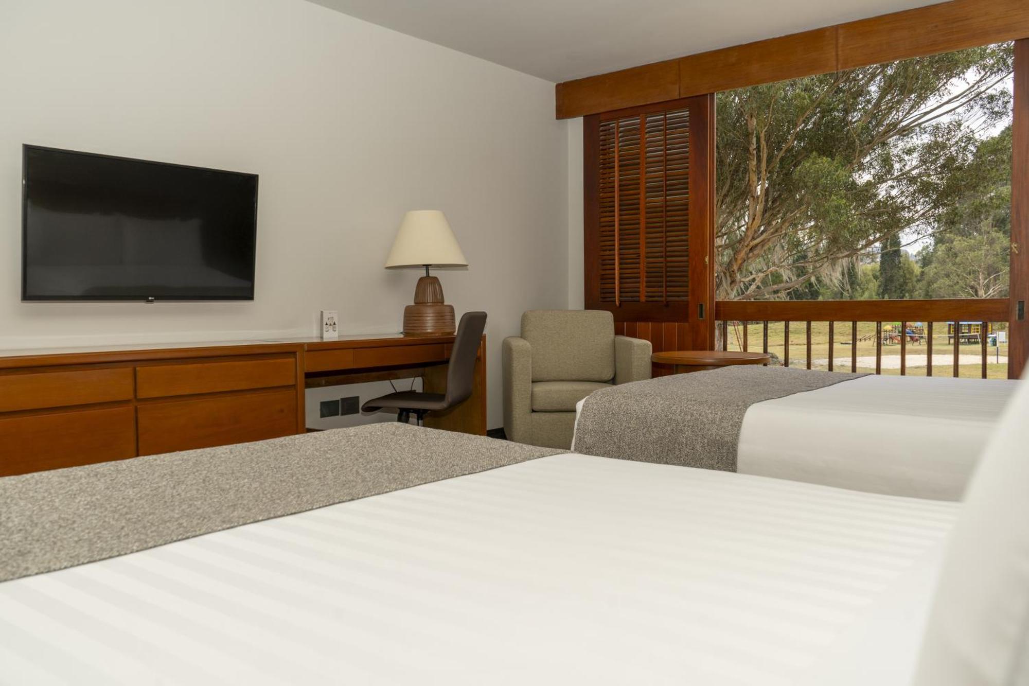 Estelar Paipa Hotel Spa & Y Centro De Convenciones Экстерьер фото A room at the hotel