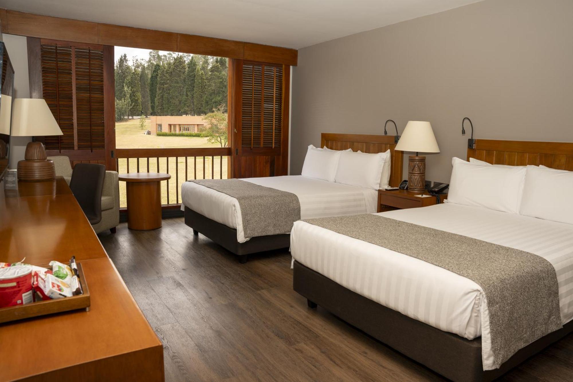 Estelar Paipa Hotel Spa & Y Centro De Convenciones Экстерьер фото A room at the Best Western Premier Emerald Coast Hotel